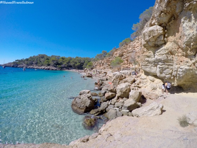 Cala Salada - the rock wall you need to climb over to get to the beach!